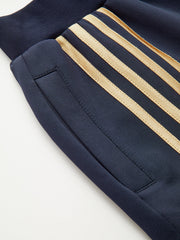 Quadruple Stripe Sweatpants